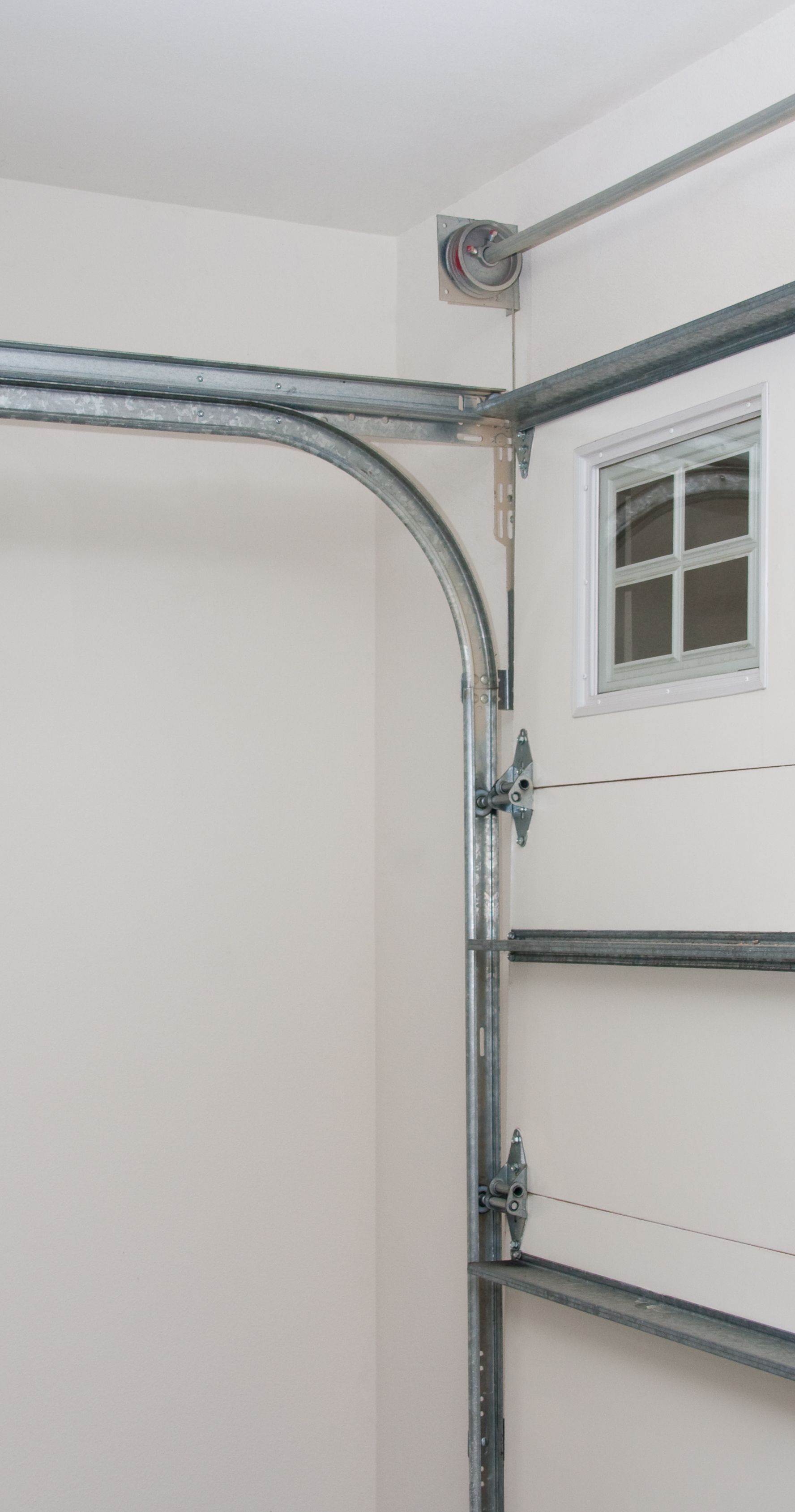 garage door track and cables -- hardware issues may be the reason why your garage door won't close