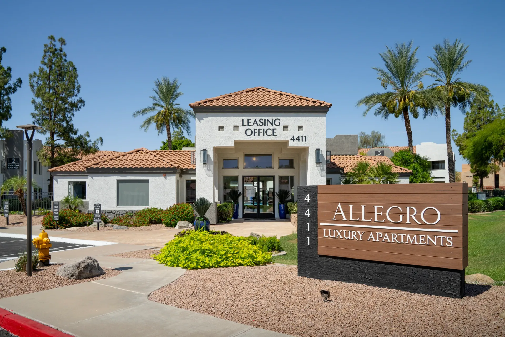 Allegro Luxury Apartments leasing office and monument sign.