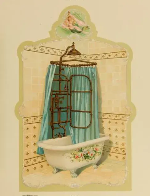 A picture of a bathtub with a blue shower curtain