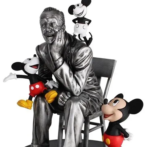 A statue of a man sitting in a chair with mickey mouse on his back