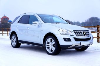 Picture of a new white vehicle stalled in the snow in Burnaby requiring a Burnaby Tow Truck.