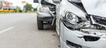 Burnaby Towing Picture of two silver cars that have been in a motor accident. Both cars are damaged and need a Burnaby tow truck.
