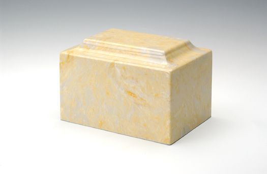 Cream-colored marble memorial box with a stepped lid on a white background