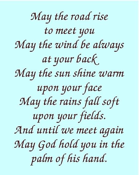 Irish blessing text on a light blue background, in black cursive font.