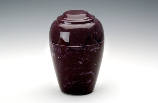 Glossy dark burgundy ceramic urn with a rounded lid on a white background