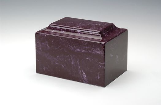 Dark purple rectangular jewelry box with a hinged lid on a white background