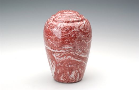 Pink and white marbled ceramic vase on a white background