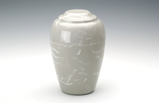 White ceramic urn with a glossy finish and subtle gray veining on a plain background