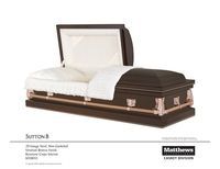 White and dark brown funeral casket with open lid on a white background