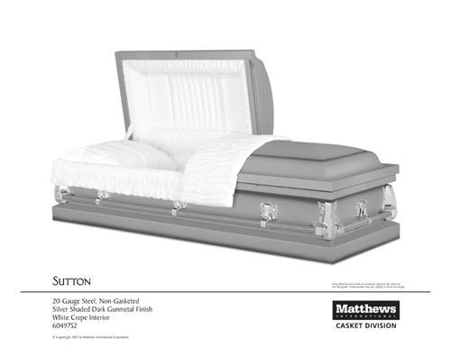 White satin-lined coffin with open lid and gray trim, Matthews casket logo in corner