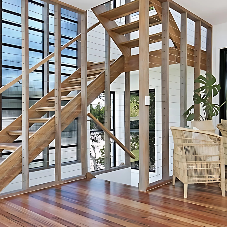 A Kitchen With Wooden Floors and Stairs Leading Up to It — Tweed Coast Cork & Timber Floors In Pottsville, NSW