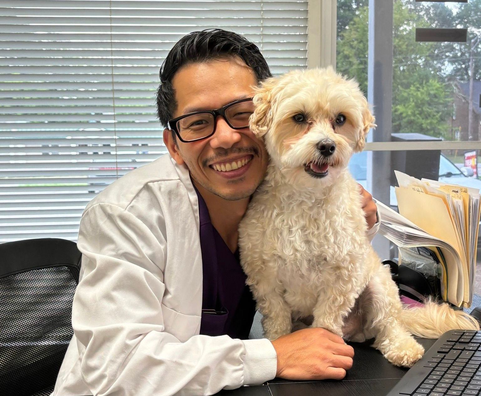 Dr. An Ta with Watson at Ocoee Dental Care