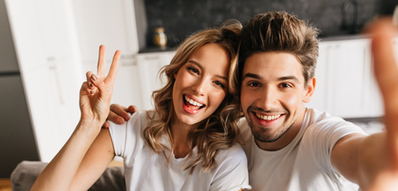 younger Couple smiling