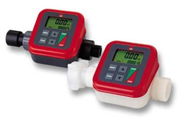 Lutz digital flow meters are sitting next to each other on a white surface .