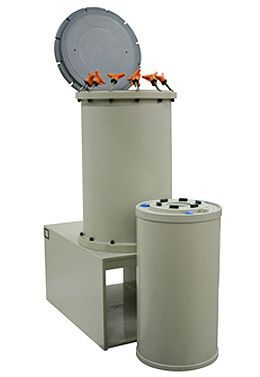 Carbon Cartridge Filter Systems sitting next to each other on a white background .