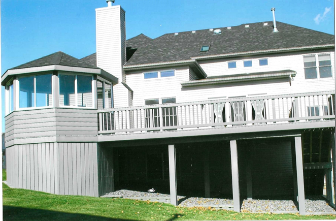 The back of a house with a large deck