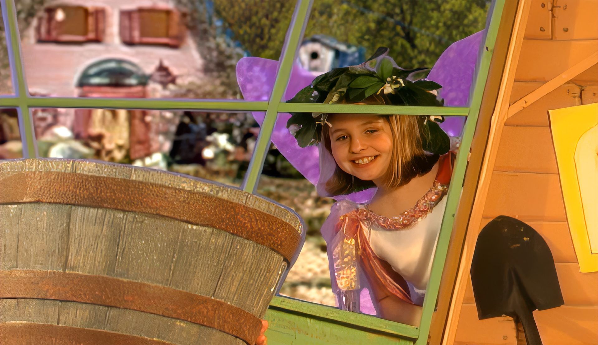 Broonie the brownie serves Mrs. Twizzleton tasty treats in her home under the hollow tree.