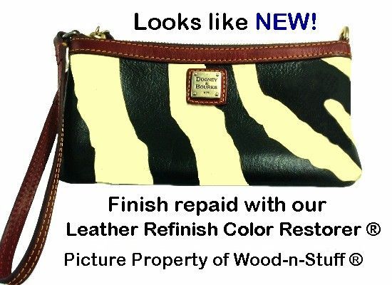 Zebra-striped leather clutch, looking new after refinishing with leather color restorer.