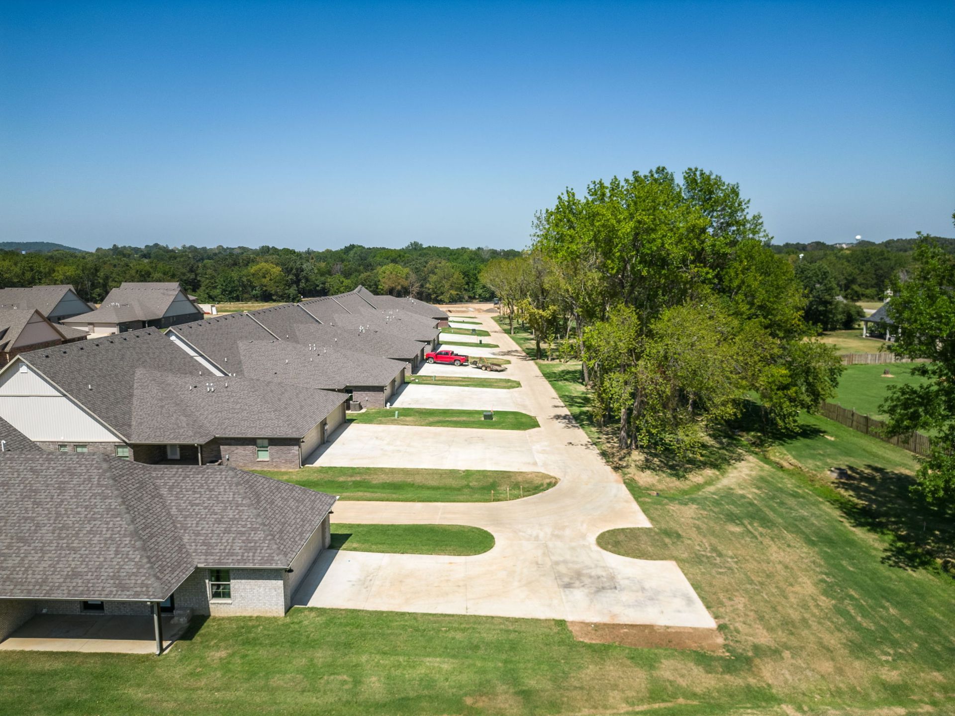 An aerial view of a row of houses in a residential area.