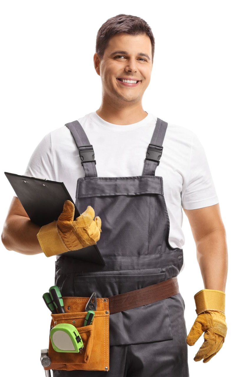 Smiling construction worker in grey overalls and gloves holding a clipboard with a tool belt around their waist.