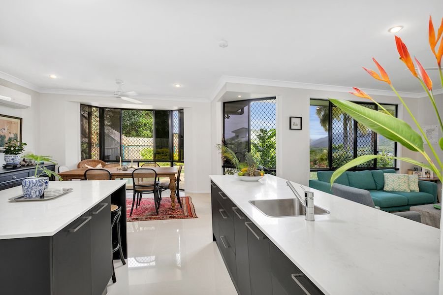 Elegant renovated kitchen with kitchen island - Builder in Cairns, QLD
