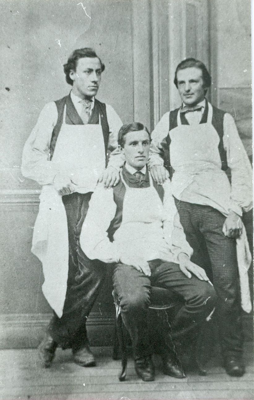 Historical image of William Sinclair and other team members.