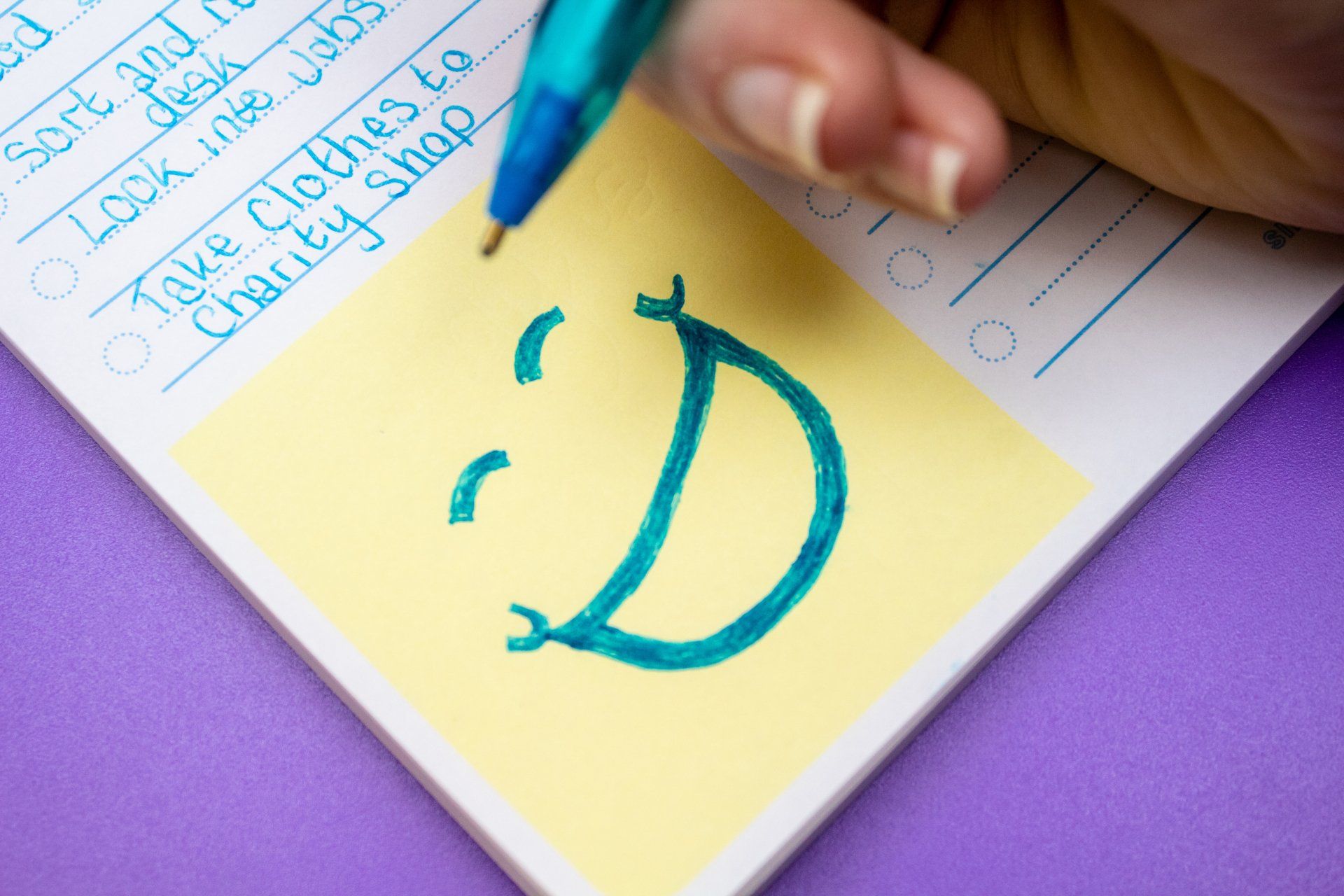 Smiley face drawn onto a To Do Pad