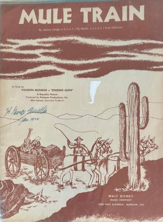 De omslagillustratie van Mule Train toont een wagen, muildieren, cactussen en een woestijnlandschap in bruin en crème.