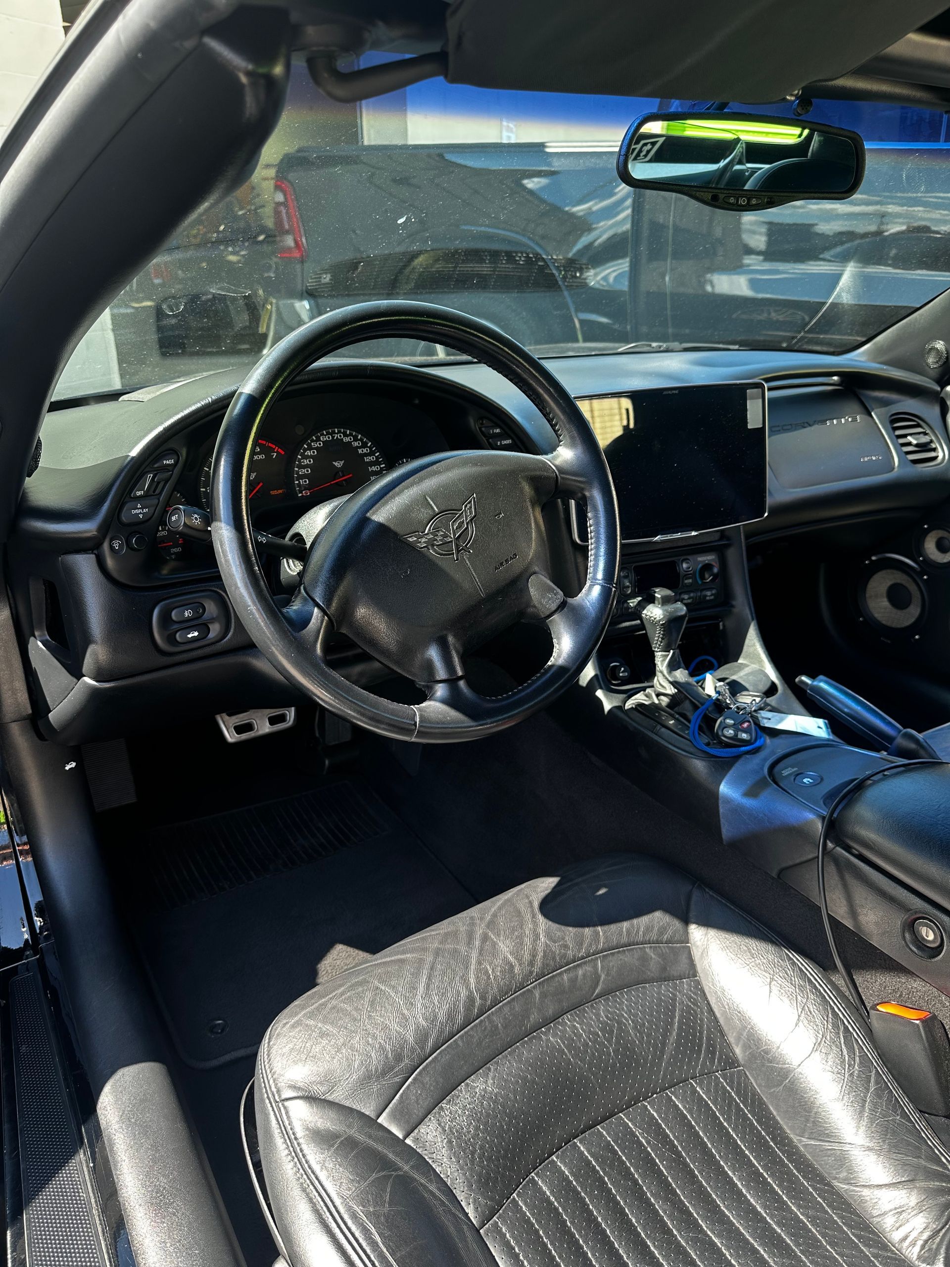 A 11in Alpine floater installed in a corvette