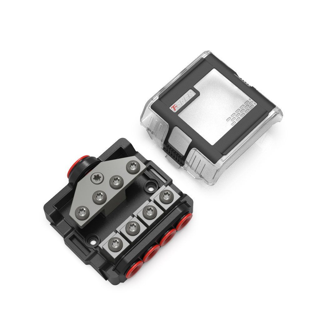 Close-up of a black and silver electrical terminal block with orange tabs