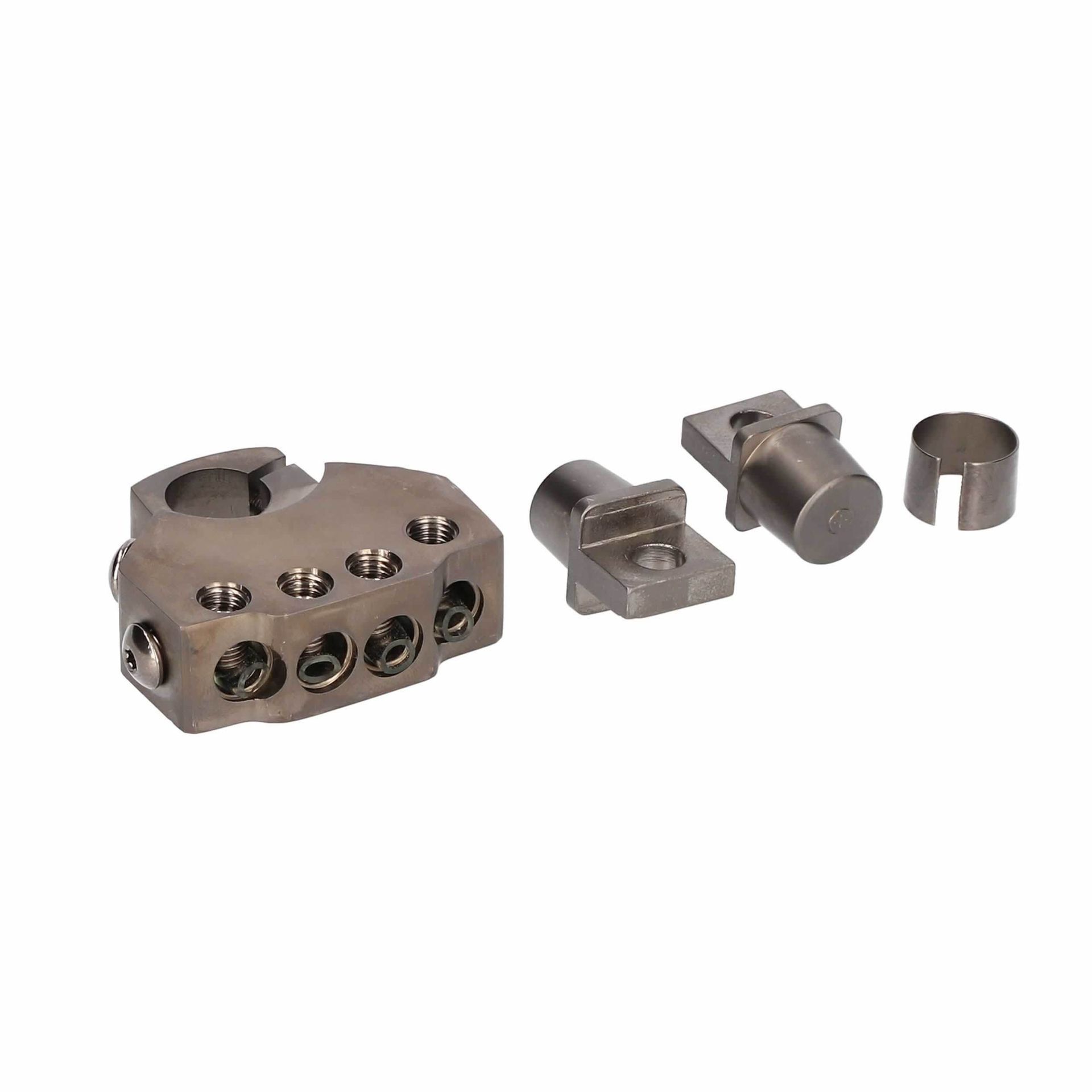 Small metal mechanical parts and fittings arranged on a white background