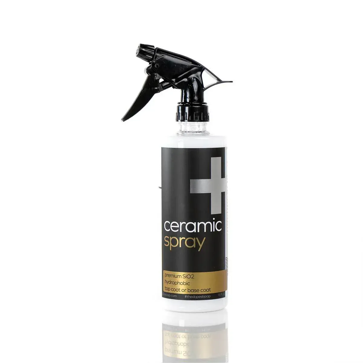 Ceramic spray bottle with black trigger nozzle and gray label on a white background