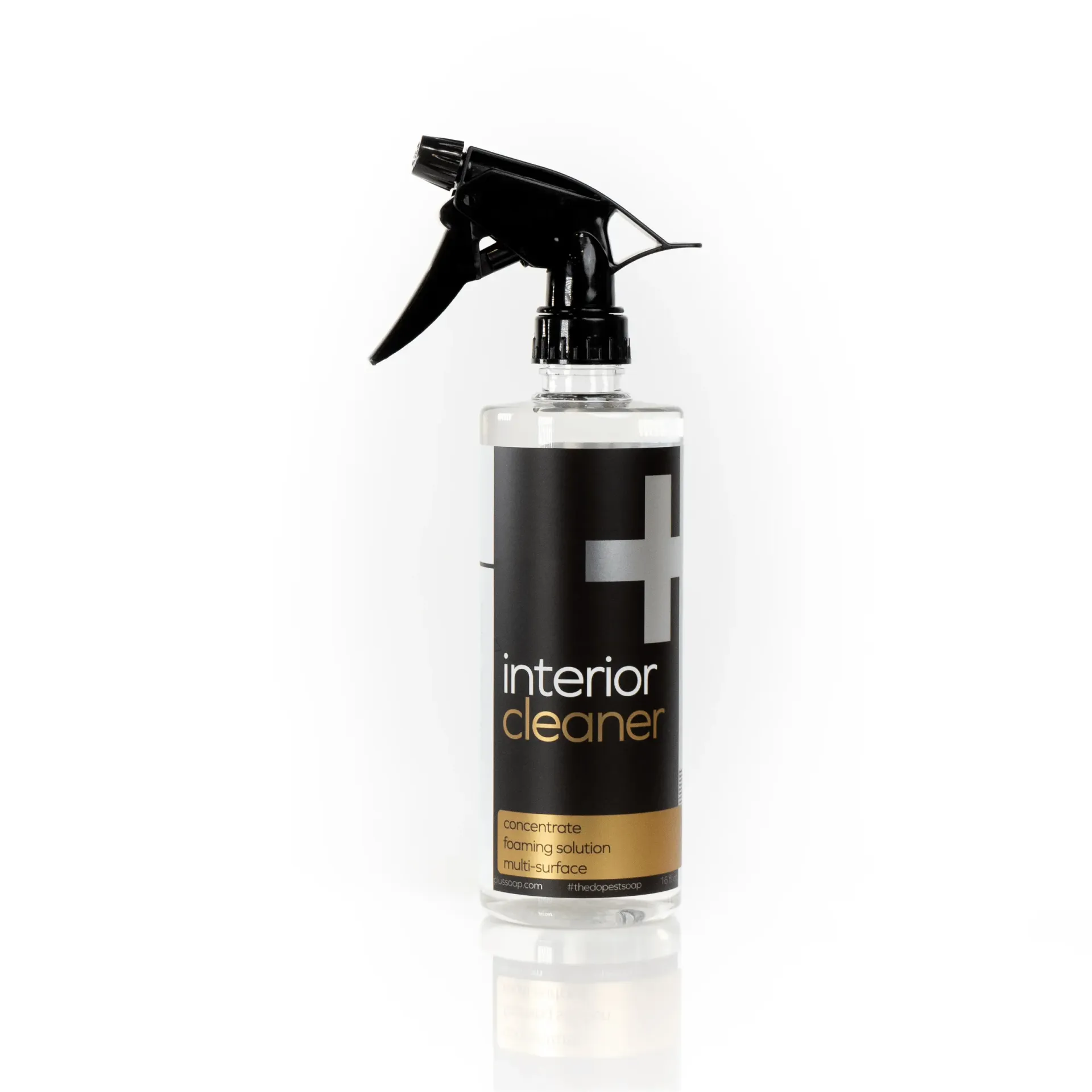 Black spray bottle labeled “interior cleaner” on a white background
