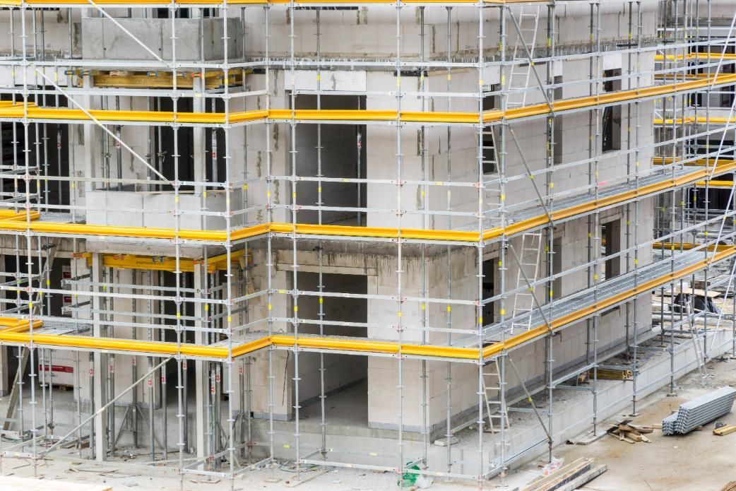 A Building Under Construction with Scaffolding Around It — Lennox Head Scaffolding in Kinvara, NSW