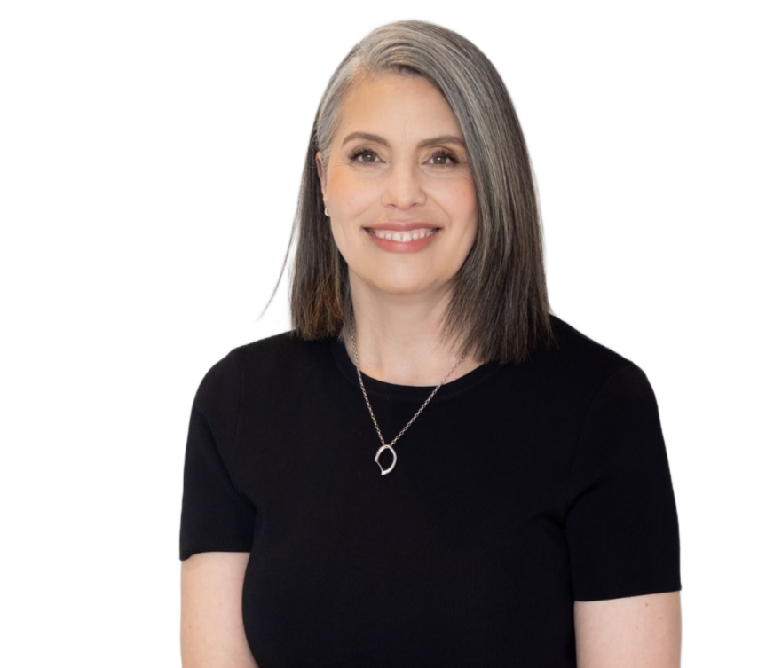 Vanessa Jardin smiles, wearing a black shirt and silver necklace, against a white background.