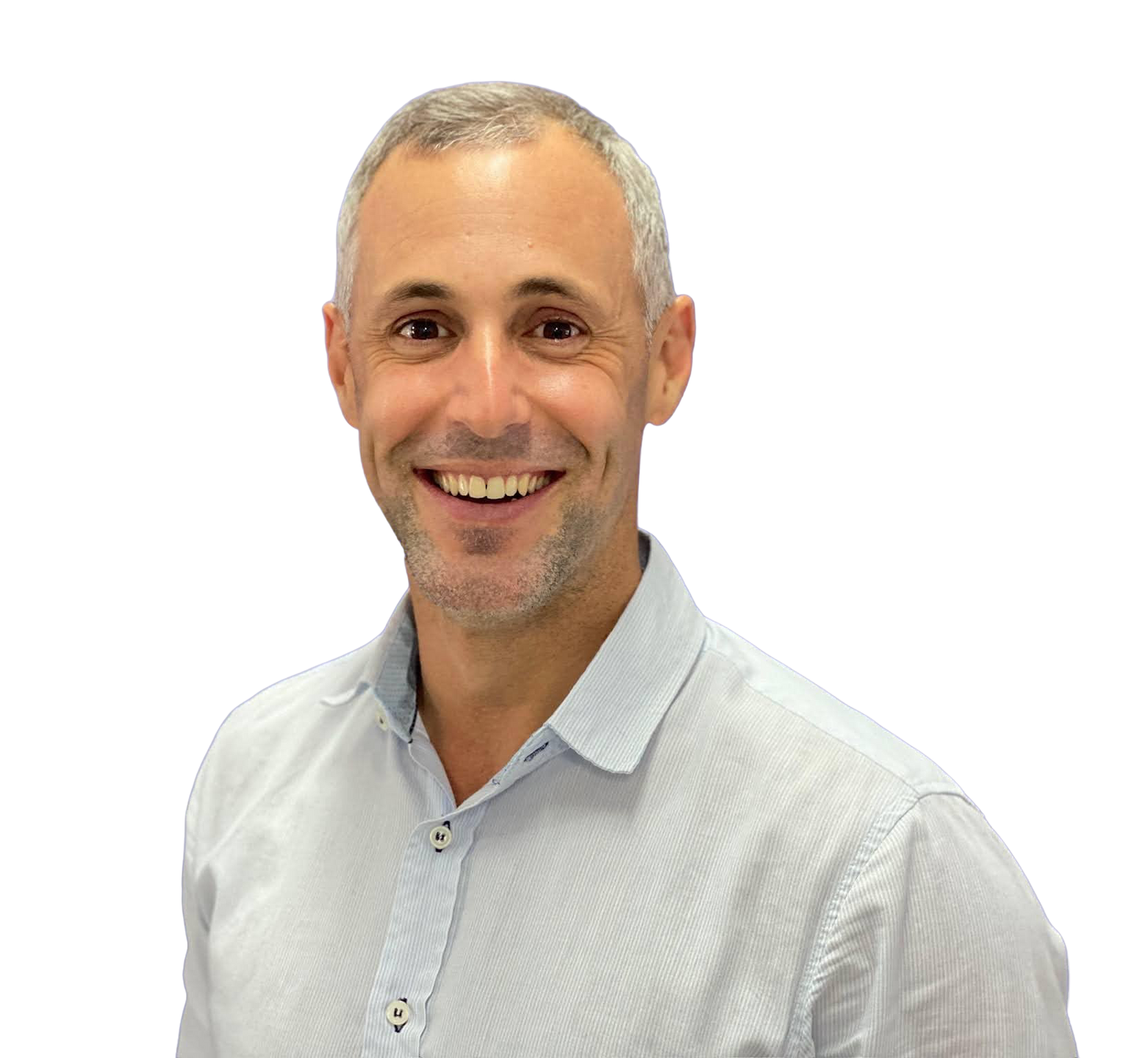 Dean Wicks smiling, wearing a light blue button-down shirt.