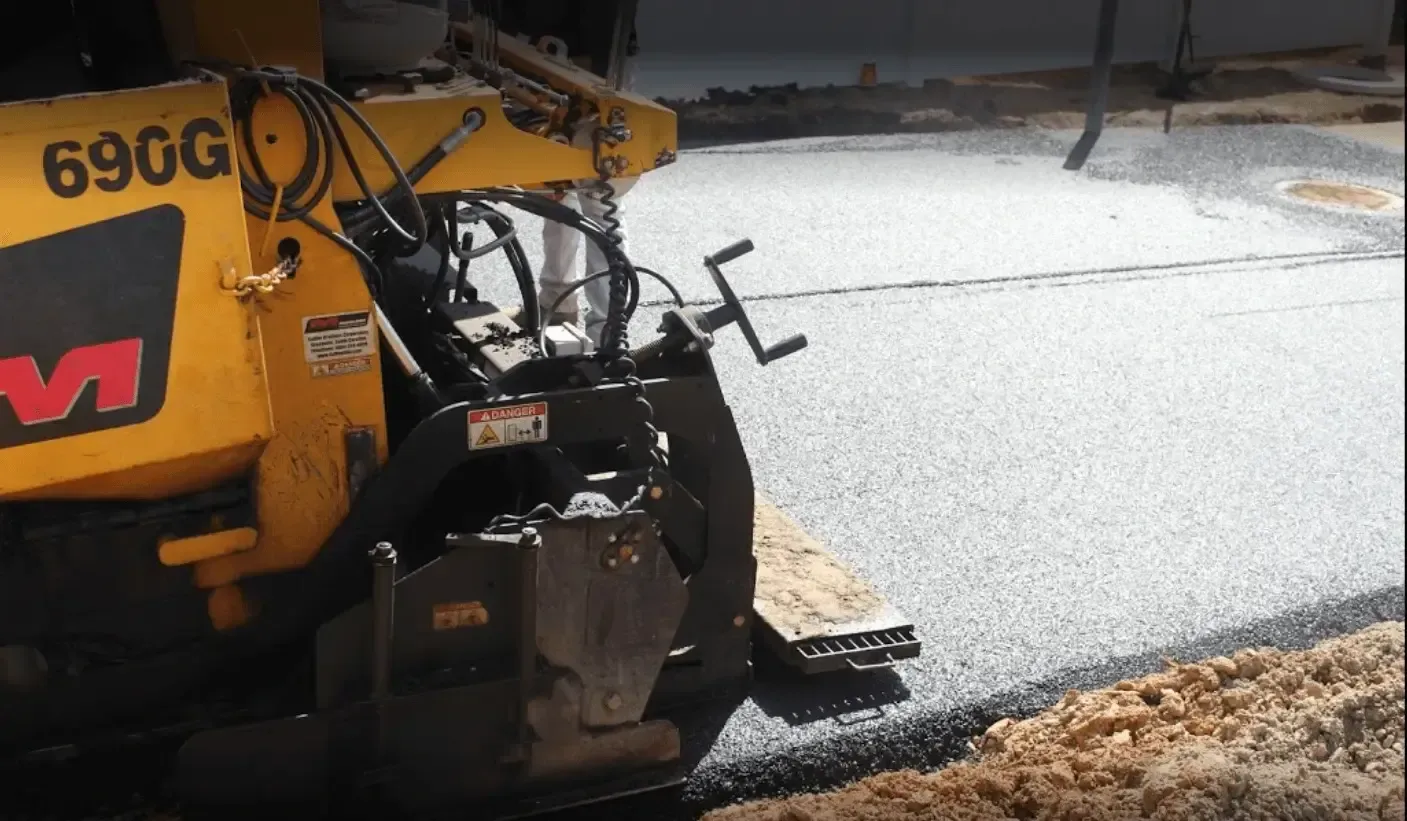 Stanley J Asphalt Paving crew completing a residential driveway job in rural York County, Pennsylvania.