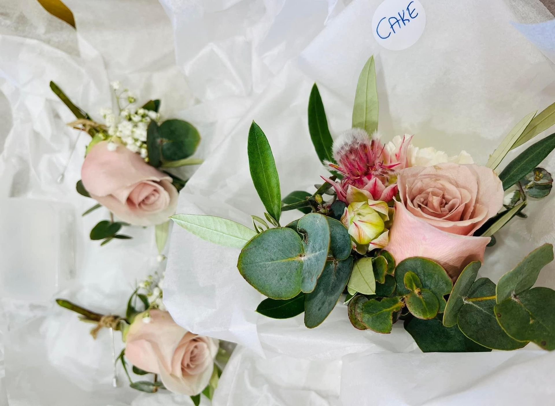 A Bunch of Flowers Are Sitting on Top of Each Other on a Table — Flower Hunt in Robina, QLD