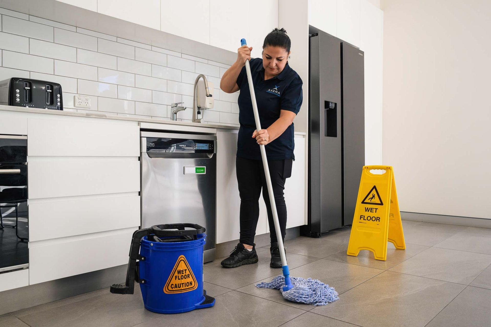 AXERA cleaner maintaining a strata property common area