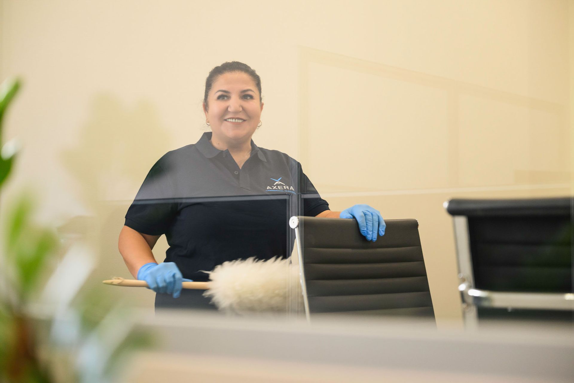 AXERA cleaner working in a commercial office
