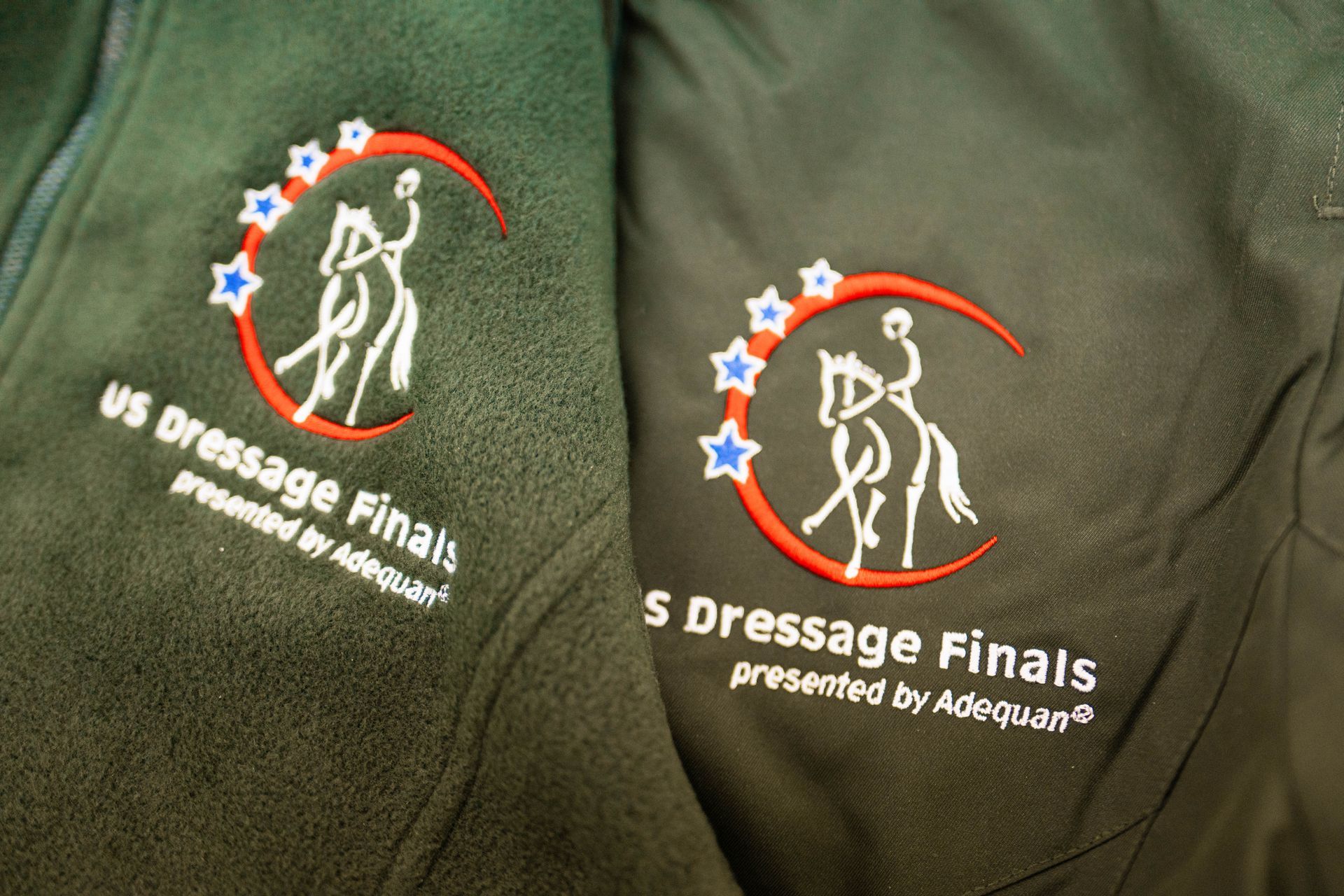 Us dressage finals is embroidered on a jacket