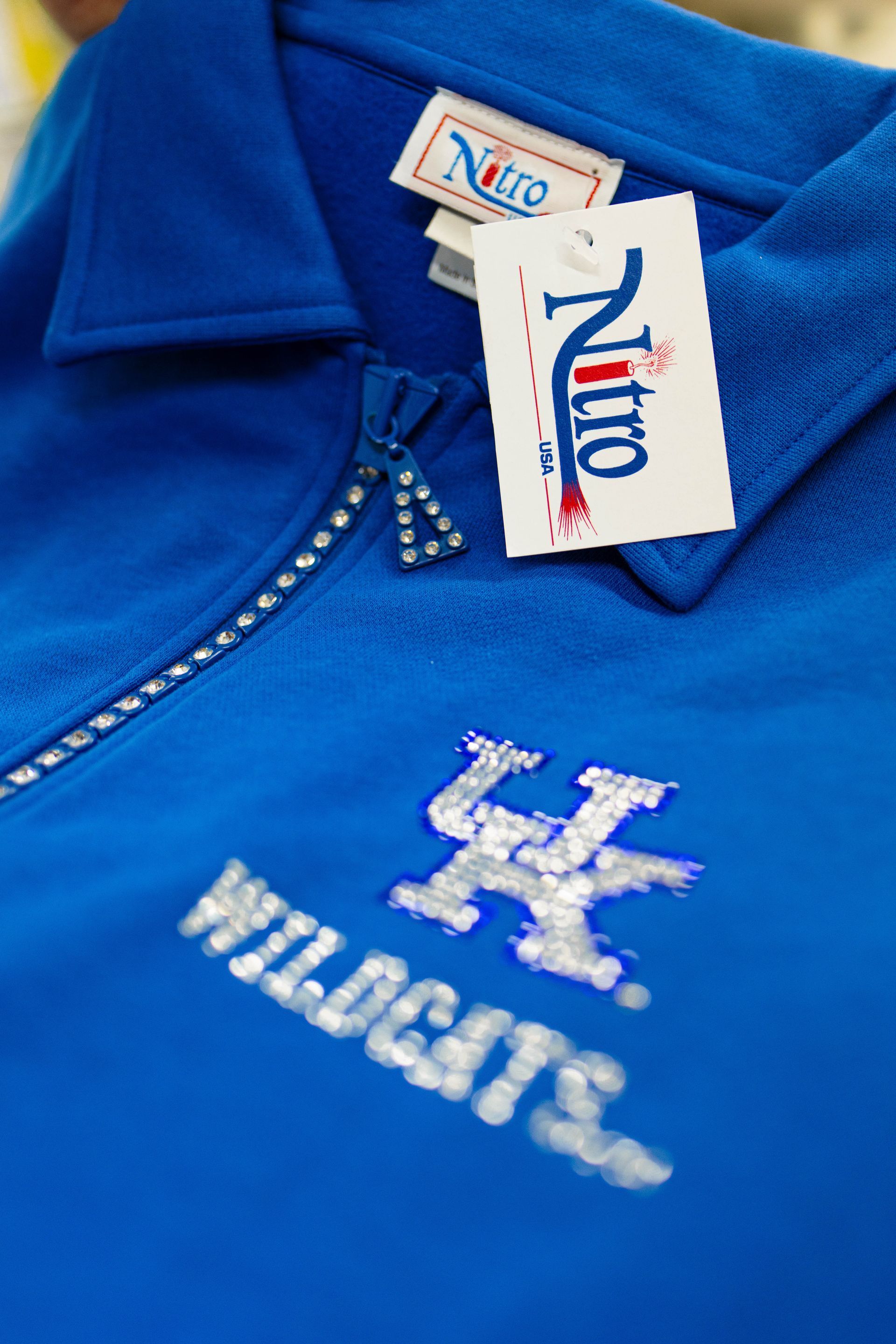 A blue shirt with the word wildcats on it