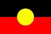 A Red Black and Yellow Flag With a Yellow Circle in the Middle — Mt Ousley Pre School in Fairy Meadow, NSW