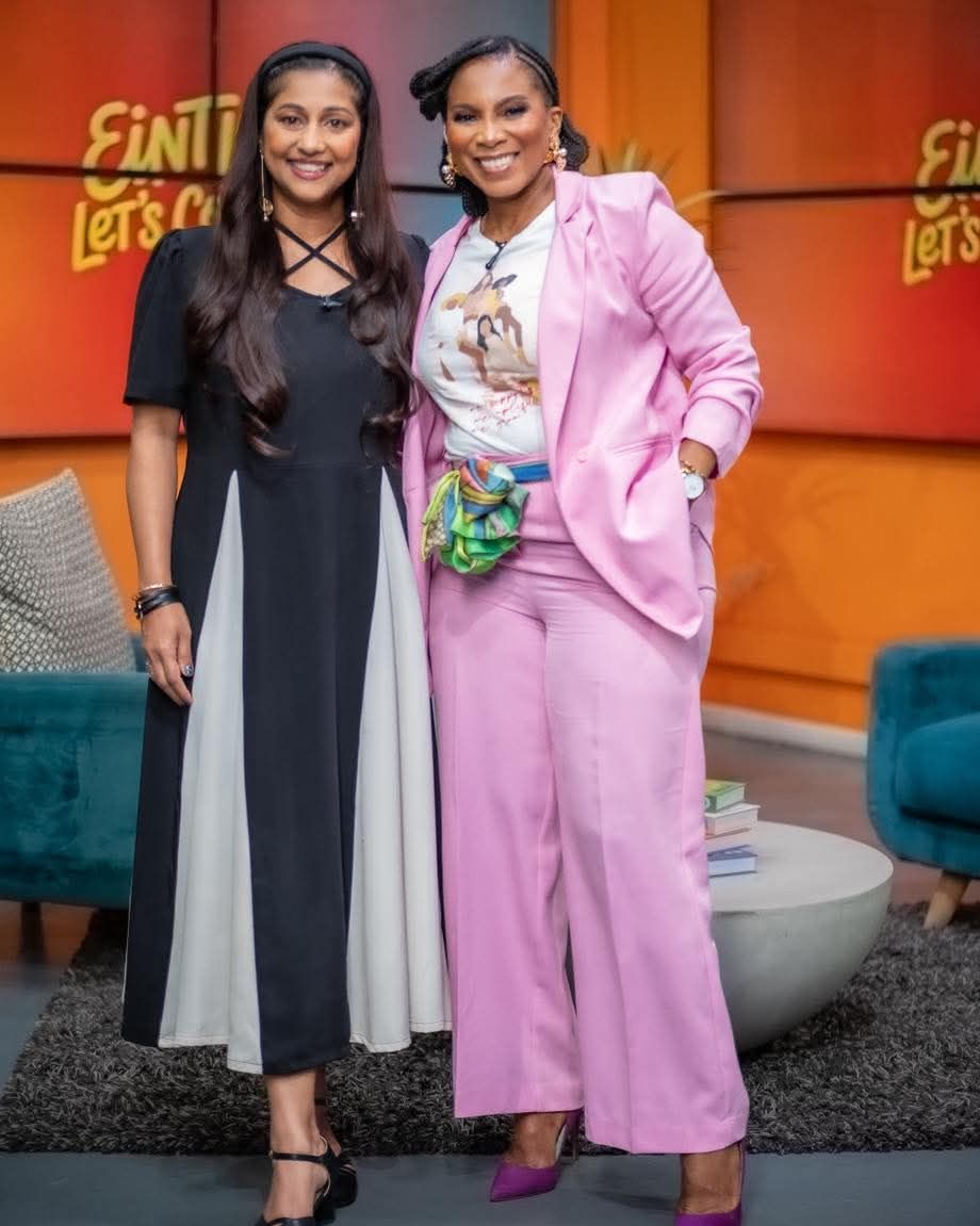 Tricia Moodley and Penny Lebyane standing together on a studio set.