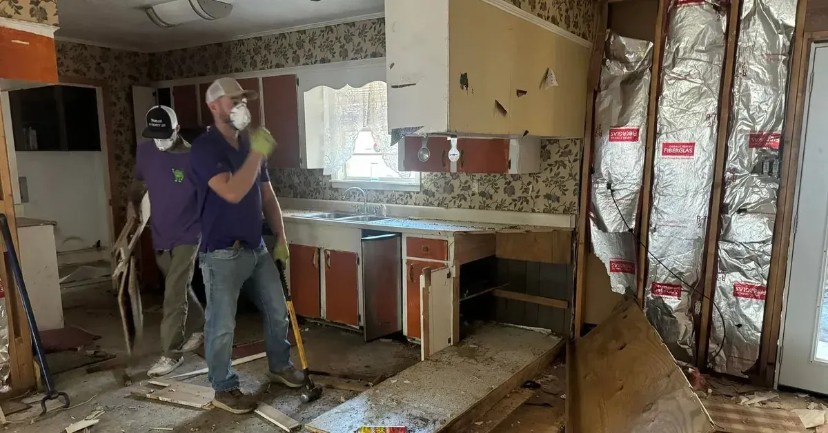 Interior demolition Jackson MS Junk-It MS crew removing kitchen cabinets