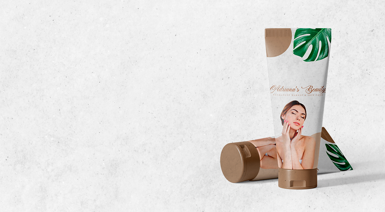 Two cosmetic product tubes with a woman's photo, leaves, and tan and brown colors on a white background.