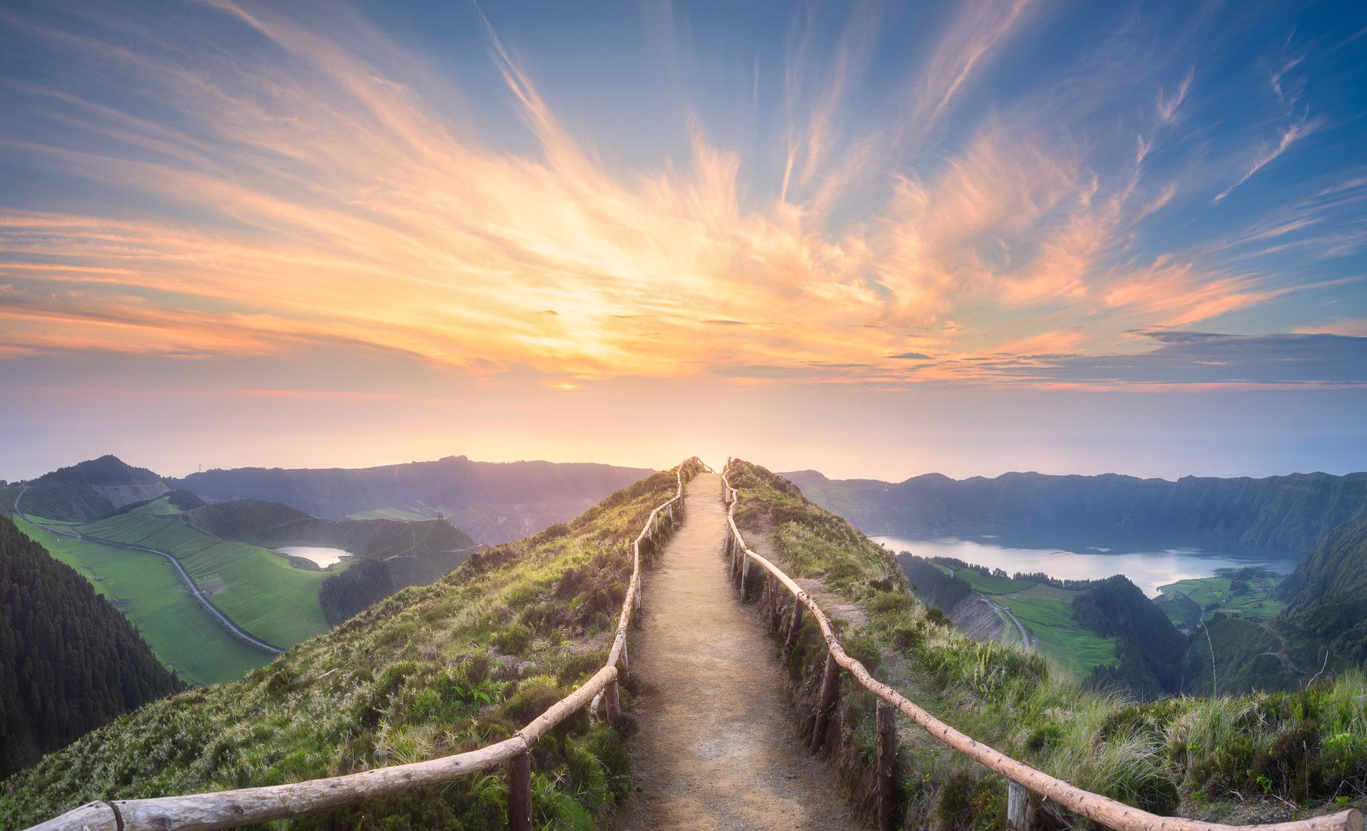Walking path on the mountain with a beautiful sunset.