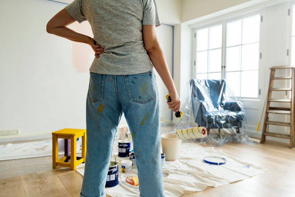 Person With Paint Roller in a Room — Jamie Frankham Painting in Ballina, NSW