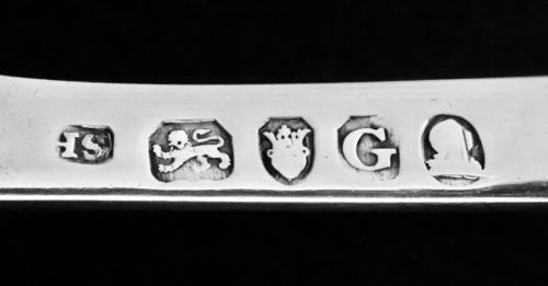Silverware hallmarks: “HS”, lion, crowned shield, “G”, and a bust.