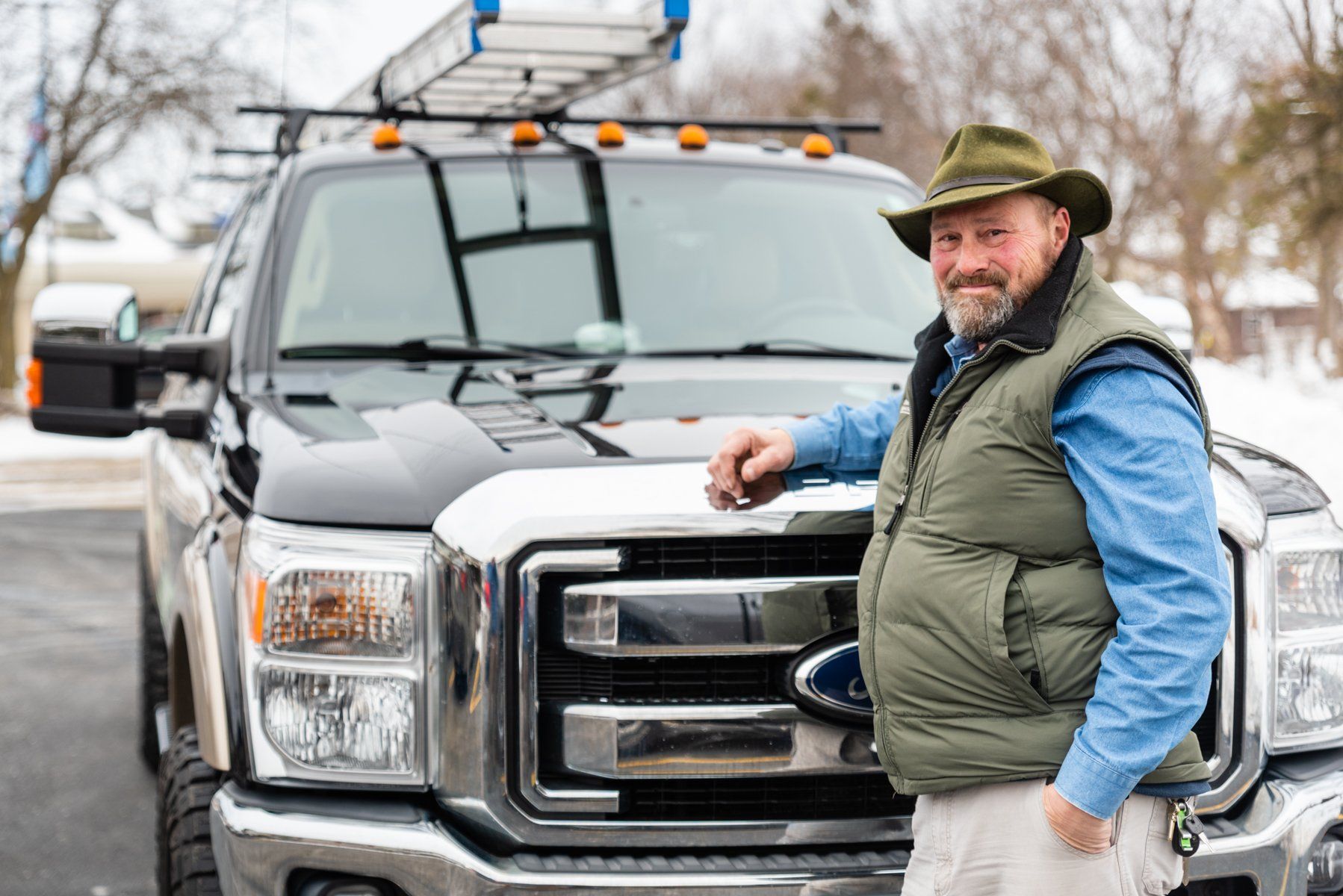 Commercial inspector Tom Dempsey in front of his truck